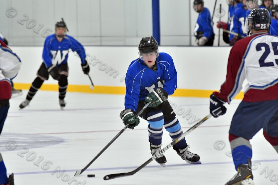 Wheaton College Men\'s Ice Hockey vs Middlesex Community College. - Photo By: KEITH NORDSTROM